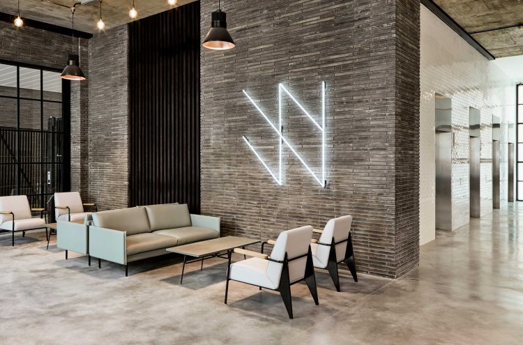 Wenlock-Works_Icons-of-Denmark_View of main reception space from the left angle with Form Sofa and Spire Coffee Table
